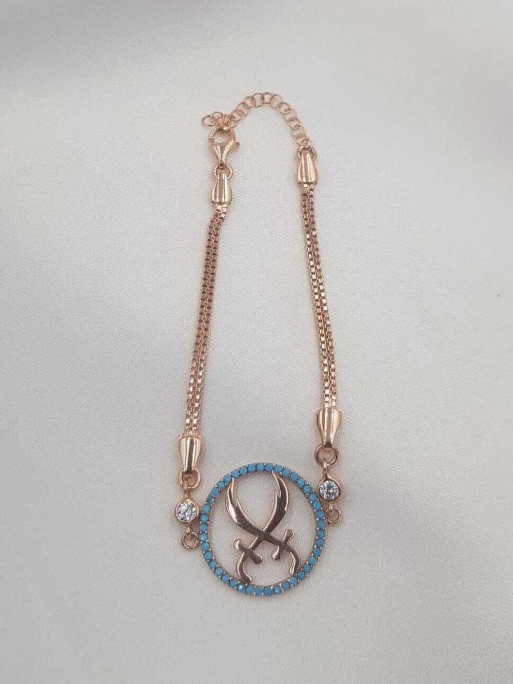 Vog Firüze Taşlı Zülfikar Kılıcı Detaylı Rose Renk 925 Ayar Gümüş Sevgiliye,Anneye,Arkadaşa Bileklik