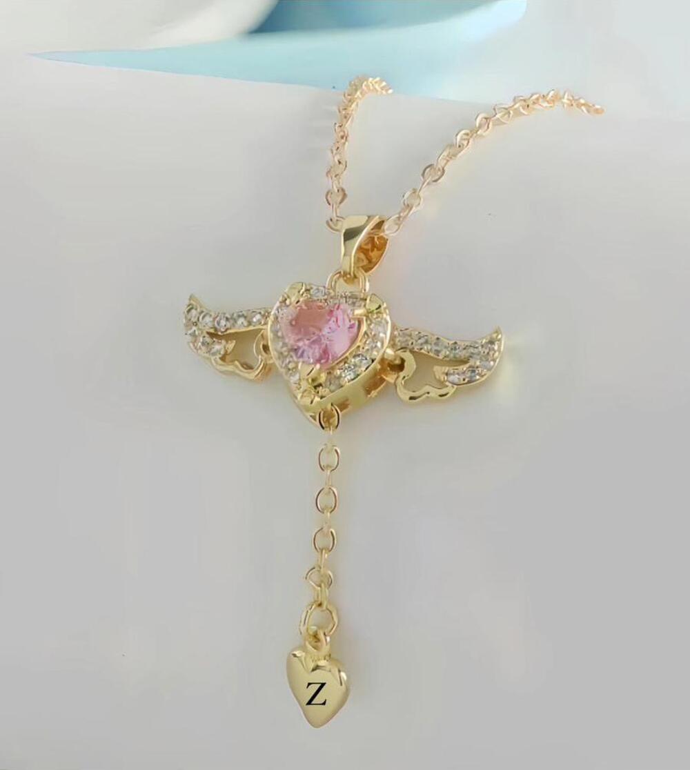 Vog Vip Çelik Pembe Kalp Taşlı Hareketli Melek Kanadı Sevgiliye,Anneye,Arkadaşa Hediye Kolye